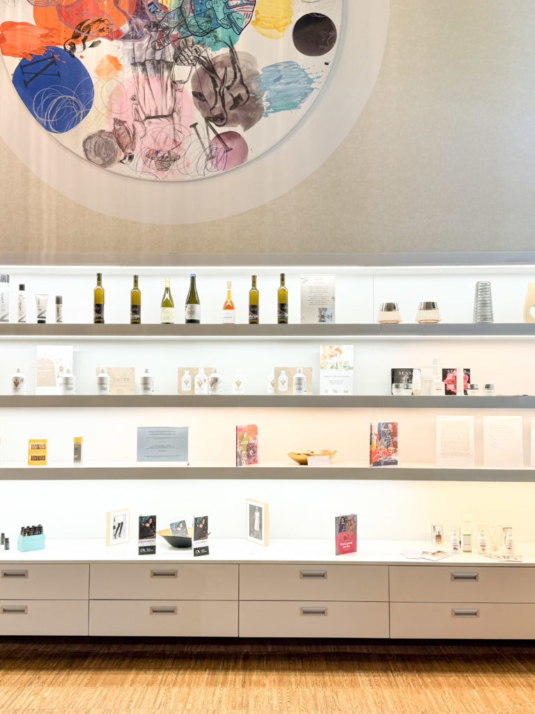 Makeup studio display with shelves, decor, and art, showcasing a beauty salon online booking system