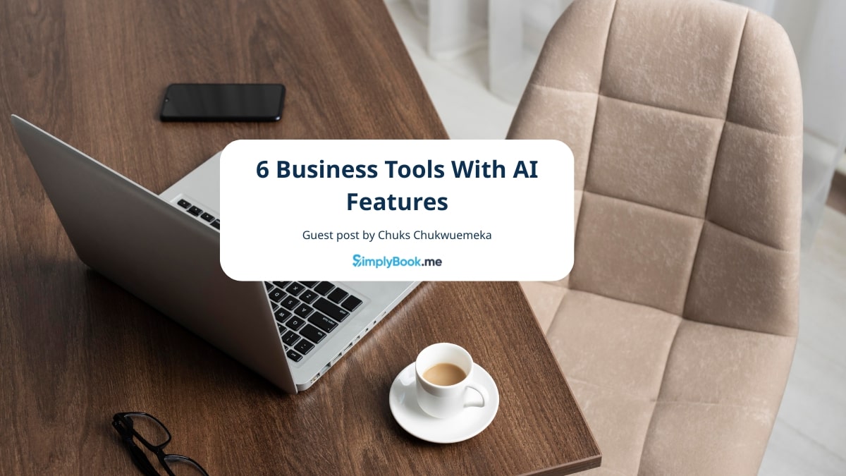 Cozy workspace with a laptop, coffee cup, glasses, and smartphone on a wooden desk. Beige cushioned chair beside. Text overlay about AI business tools.